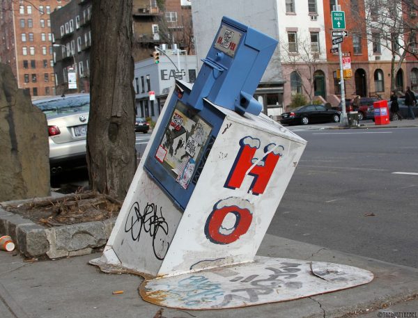 street art of melting newspapers